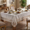 Wholesale special gardenio luxury tablecloth with elegant guipure lace border on a formal hotel banquet setup